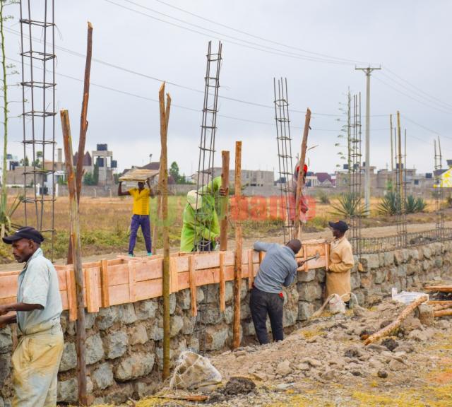 Ongoing Construction of Stone Wall Fence at Royale Court - Juja